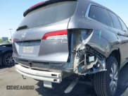 ✅ 2021 Honda Pilot EX • VIN: 5FNYF5H31MB004675 • Lot: 42562045. Wystawiony na IAAI z przebiegiem 83 050 mil. Bezpłatny archiwum sprzedaży aukcyjnych z USA i szczegółowy raport historii pojazdu na DreamBid. Zdjęcie 6.