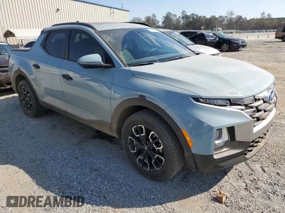 2023 Hyundai Santa Cruz SEL z VIN 5NTJCDAE7PH041270, wystawiony jako Copart lot #76526784 z przebiegiem 25 084 mil mil oraz Szkoda całkowita • Salvage title. Historia ofert i sprzedaży dostępna na DreamBid. Obrazek 4.