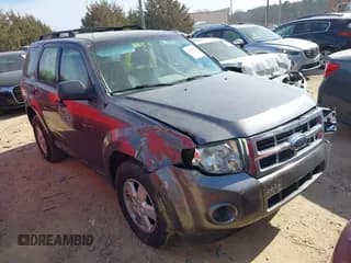 ✅ 2009 Ford Escape XLS • VIN: 1FMCU027X9KD07605 • Lot: 41849188. Listed on IAAI with 166,363 mi. Free auction sales archive from the USA and detailed vehicle history report at DreamBid. Image 1.