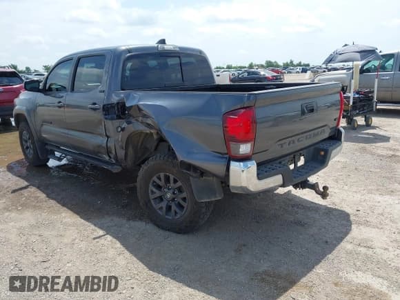✅ 2023 Toyota Tacoma SR5 • VIN: 3TMAZ5CN0PM200768 • Лот: 42439143. Опубликован ранее на IAAI с пробегом 68 631 миль. Бесплатный доступ к архиву аукционных продаж из США и подробный отчёт об истории автомобиля на DreamBid. Изображение 3.