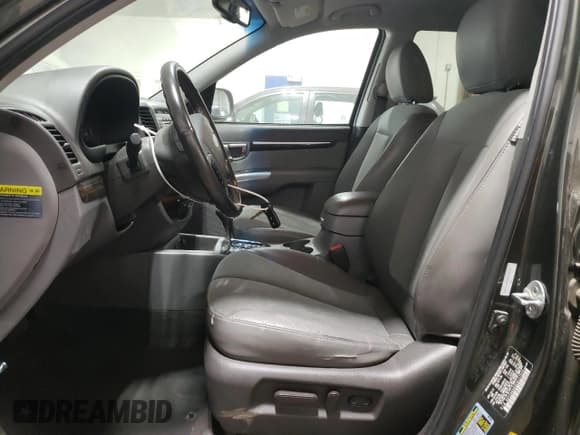 ✅ 2012 Hyundai Santa Fe SE • VIN: 5XYZH4AG3CG117525 • Lot: 75181374. Listed on Copart with 96,764 mi. Free auction sales archive from the USA and detailed vehicle history report at DreamBid. Image 7.