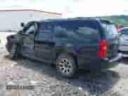 2014 Chevrolet Suburban LT with VIN 1GNSKJE77ER233057, listed as a IAAI auction lot 42696074 with 151,658 mi miles and . Bid and sale history available at DreamBid. Image 3.