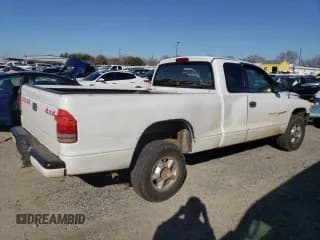 ✅ 1999 Dodge Dakota SLT • VIN: 1B7GG22Y6XS119274 • Lot: 46947005. Wystawiony na Copart z przebiegiem 264 537 mil. Bezpłatny archiwum sprzedaży aukcyjnych z USA i szczegółowy raport historii pojazdu na DreamBid. Zdjęcie 3.