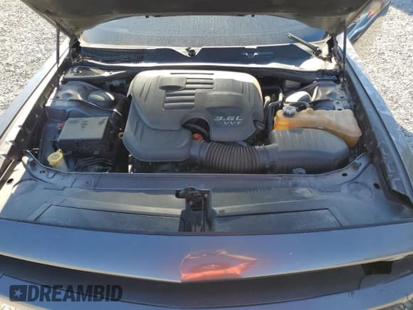 ✅ 2015 Dodge Challenger SXT • VIN: 2C3CDZAG7FH909685 • Lot: 93106625. Wystawiony na Copart z przebiegiem 242 858 mil. Bezpłatny archiwum sprzedaży aukcyjnych z USA i szczegółowy raport historii pojazdu na DreamBid. Zdjęcie 11.