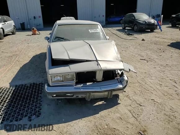 ✅ 1984 Oldsmobile Cutlass Supreme • VIN: 1G3AR69A7EM484256 • Lot: 49709405. Wystawiony na Copart z przebiegiem 437 399 mil. Bezpłatny archiwum sprzedaży aukcyjnych z USA i szczegółowy raport historii pojazdu na DreamBid. Zdjęcie 11.