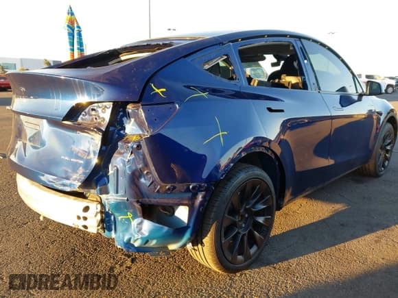 ✅ 2023 Tesla Model Y Long Range • VIN: 7SAYGDEE0PF929050 • Lot: 43544847. Listed on IAAI with 41,002 mi. Free auction sales archive from the USA and detailed vehicle history report at DreamBid. Image 4.