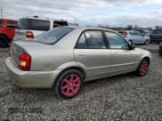 ✅ 2002 Mazda Protege DX • VIN: JM1BJ225221620047 • Lot: 82218424. Wystawiony na Copart z przebiegiem 113 281 mil. Bezpłatny archiwum sprzedaży aukcyjnych z USA i szczegółowy raport historii pojazdu na DreamBid. Zdjęcie 3.