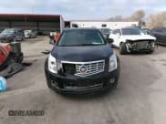 ✅ 2016 Cadillac SRX Performance Collection • VIN: 3GYFNCE32GS505552 • Lot: 40949642. Listed on IAAI with 143,343 mi. Free auction sales archive from the USA and detailed vehicle history report at DreamBid. Image 12.