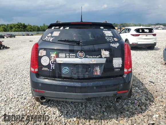 ✅ 2014 Cadillac SRX Performance Collection • VIN: 3GYFNFE32ES571405 • Lot: 68138685. Listed on Copart with 145,819 mi. Free auction sales archive from the USA and detailed vehicle history report at DreamBid. Image 6.