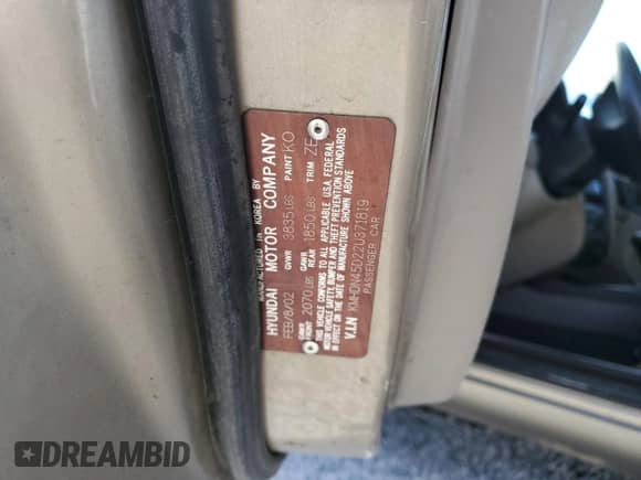2002 Hyundai Elantra GLS z VIN KMHDN45D22U371819, wystawiony jako Copart lot #77000954 z przebiegiem 177 202 mil mil oraz Szkoda całkowita • Salvage title. Historia ofert i sprzedaży dostępna na DreamBid. Obrazek 14.