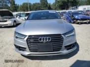 ✅ 2017 Audi A7 Premium Plus • VIN: WAUW2AFCXHN120945 • Лот: 66336185. Опубликован ранее на Copart с пробегом 82 847 миль. Бесплатный доступ к архиву аукционных продаж из США и подробный отчёт об истории автомобиля на DreamBid. Изображение 5.