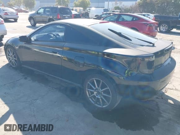 ✅ 2001 Toyota Celica GT • VIN: JTDDR32TX10095121 • Lot: 43815313. Listed on IAAI with 165,549 mi. Free auction sales archive from the USA and detailed vehicle history report at DreamBid. Image 3.