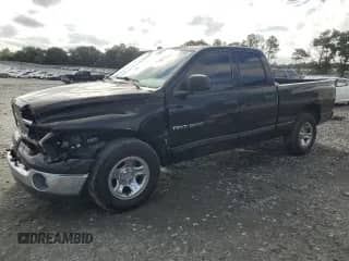 2003 Dodge 1500 SLT z VIN 1D3HA18DX3J606585, wystawiony jako Copart lot #70846494 z przebiegiem 292 023 mil mil oraz Szkoda całkowita • Salvage title. Historia ofert i sprzedaży dostępna na DreamBid. Obrazek 1.