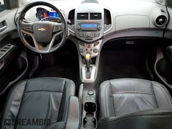 2012 Chevrolet Sonic LTZ с VIN 1G1JE5SH1C4126847, выставлен на аукционе Copart как лот 47252625 с пробегом 113 399 миль миль и Списание • Salvage title. История ставок и продаж доступна на DreamBid. Изображение 8.