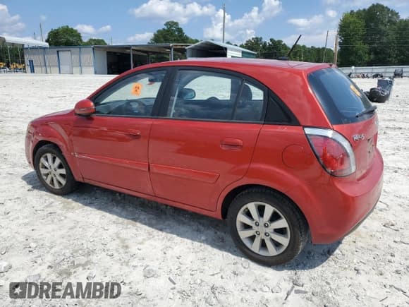 ✅ 2010 Kia Rio LX • VIN: KNADH5A35A6666444 • Lot: 65407605. Listed on Copart with 90,555 mi. Free auction sales archive from the USA and detailed vehicle history report at DreamBid. Image 2.