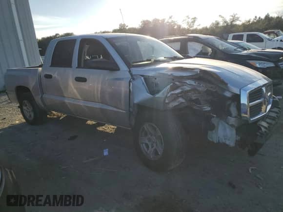 2005 Dodge Dakota SLT с VIN 1D7HE48K75S207617, выставлен на аукционе Copart как лот 81713524 с пробегом Не указан миль и Списание • Salvage title. История ставок и продаж доступна на DreamBid. Изображение 4.