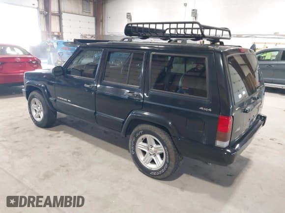 ✅ 2001 Jeep Cherokee Sport • VIN: 1J4FF58S11L562933 • Lot: 41944672. Listed on IAAI with 163,078 mi. Free auction sales archive from the USA and detailed vehicle history report at DreamBid. Image 3.