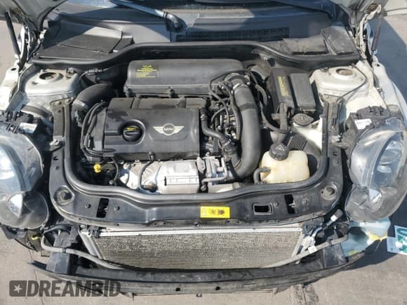 ✅ 2012 MINI Convertible S • VIN: WMWZP3C51CT296464 • Лот: 64290005. Опубликован ранее на Copart с пробегом 107 580 миль. Бесплатный доступ к архиву аукционных продаж из США и подробный отчёт об истории автомобиля на DreamBid. Изображение 11.