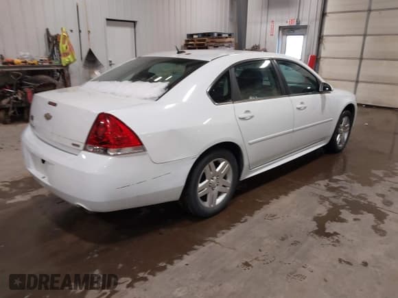 ✅ 2014 Chevrolet Impala LT • VIN: 2G1WB5E37E1139177 • Lot: 43544664. Listed on IAAI with 191,219 mi. Free auction sales archive from the USA and detailed vehicle history report at DreamBid. Image 4.