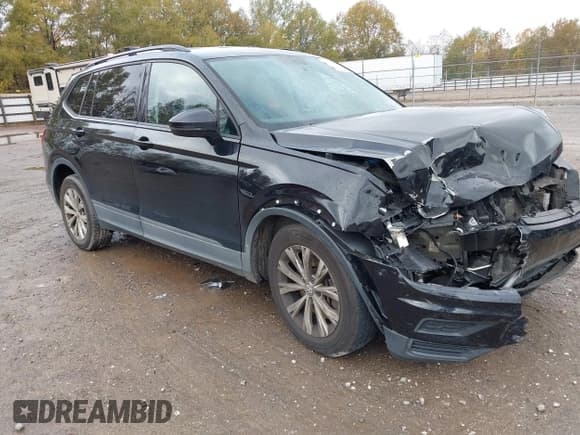 ✅ 2020 Volkswagen Tiguan S • VIN: 3VV1B7AX0LM082124 • Лот: 43534001. Опубликован ранее на IAAI с пробегом 101 006 миль. Бесплатный доступ к архиву аукционных продаж из США и подробный отчёт об истории автомобиля на DreamBid. Изображение 1.