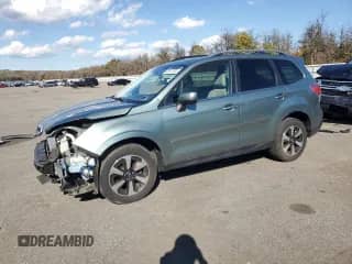 2017 Subaru Forester Limited with VIN JF2SJARC0HH523882, listed as a Copart auction lot 82651095 with 65,088 mi miles and Salvage title. Bid and sale history available at DreamBid. Image 1.