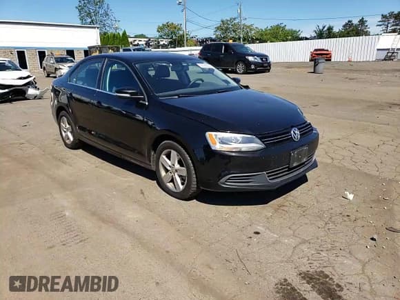 ✅ 2013 Volkswagen Jetta TDI w/Premium/Nav • VIN: 3VW3L7AJ7DM376098 • Lot: 65588905. Listed on Copart with 178,910 mi. Free auction sales archive from the USA and detailed vehicle history report at DreamBid. Image 13.