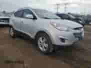 2011 Hyundai Tucson GLS z VIN KM8JU3AC7BU284852, wystawiony jako Copart lot #69496824 z przebiegiem 155 411 mil mil oraz Szkoda całkowita • Salvage title. Historia ofert i sprzedaży dostępna na DreamBid. Obrazek 4.