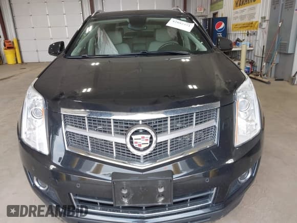 ✅ 2012 Cadillac SRX Premium Collection • VIN: 3GYFNFE35CS646675 • Lot: 42882951. Listed on IAAI with 71,367 mi. Free auction sales archive from the USA and detailed vehicle history report at DreamBid. Image 12.
