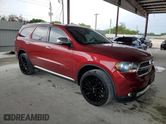 ✅ 2013 Dodge Durango Citadel • VIN: 1C4SDHET0DC667833 • Lot: 71525725. Listed on Copart with 171,478 mi. Free auction sales archive from the USA and detailed vehicle history report at DreamBid. Image 4.
