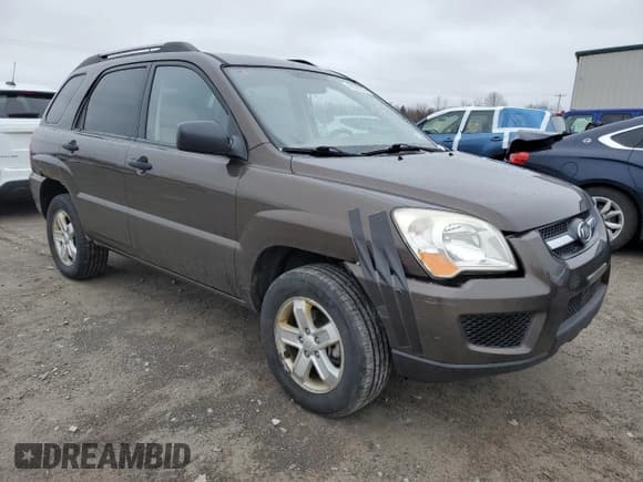 ✅ 2009 Kia Sportage EX • VIN: KNDJF723897635796 • Lot: 49356245. Wystawiony na Copart z przebiegiem 154 233 mil. Bezpłatny archiwum sprzedaży aukcyjnych z USA i szczegółowy raport historii pojazdu na DreamBid. Zdjęcie 4.