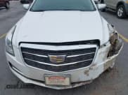 ✅ 2015 Cadillac ATS Standard AWD • VIN: 1G6AG1RX0F0127073 • Lot: 41296448. Listed on IAAI with 119,718 mi. Free auction sales archive from the USA and detailed vehicle history report at DreamBid. Image 6.