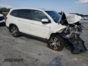 ✅ 2017 Honda Pilot EX-L • VIN: 5FNYF5H79HB013598 • Lot: 62476735. Listed on Copart with Not provided. Free auction sales archive from the USA and detailed vehicle history report at DreamBid. Image 4.