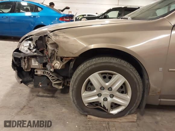 ✅ 2006 Chevrolet Impala LS • VIN: 2G1WB58K969338138 • Lot: 43652554. Listed on IAAI with 204,332 mi. Free auction sales archive from the USA and detailed vehicle history report at DreamBid. Image 6.