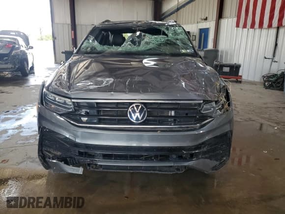 ✅ 2023 Volkswagen Tiguan SE R-Line Black • VIN: 3VV8B7AX2PM076331 • Лот: 82173045. Опубликован ранее на Copart с пробегом Не указан. Бесплатный доступ к архиву аукционных продаж из США и подробный отчёт об истории автомобиля на DreamBid. Изображение 5.