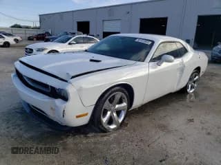 ✅ 2014 Dodge Challenger SXT • VIN: 2C3CDYAG7EH209786 • Lot: 80151564. Wystawiony na Copart z przebiegiem 129 689 mil. Bezpłatny archiwum sprzedaży aukcyjnych z USA i szczegółowy raport historii pojazdu na DreamBid. Zdjęcie 1.