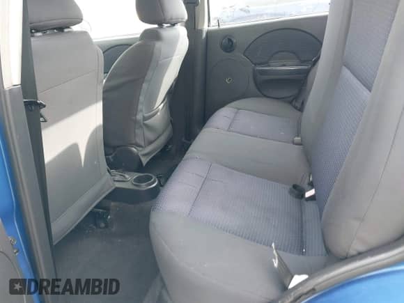 2006 Chevrolet Aveo LS z VIN KL1TD56696B543863, wystawiony jako IAAI lot #41446969 z przebiegiem 222 866 mil mil oraz . Historia ofert i sprzedaży dostępna na DreamBid. Obrazek 8.