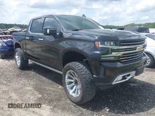 ✅ 2019 Chevrolet Silverado 1500 High Country • VIN: 1GCUYHEL7KZ142131 • Лот: 42742660. Опубликован ранее на IAAI с пробегом 125 543 миль. Бесплатный доступ к архиву аукционных продаж из США и подробный отчёт об истории автомобиля на DreamBid. Изображение 1.
