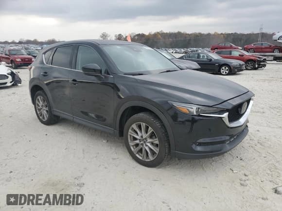 ✅ 2019 Mazda CX-5 Grand Touring • VIN: JM3KFBDM1K0676841 • Lot: 93914425. Wystawiony na Copart z przebiegiem 50 417 mil. Bezpłatny archiwum sprzedaży aukcyjnych z USA i szczegółowy raport historii pojazdu na DreamBid. Zdjęcie 4.