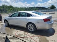 ✅ 2018 Chevrolet Impala LT • VIN: 2G1105SA0J9164033 • Лот: 61465184. Опубликован ранее на Copart с пробегом 104 208 миль. Бесплатный доступ к архиву аукционных продаж из США и подробный отчёт об истории автомобиля на DreamBid. Изображение 2.