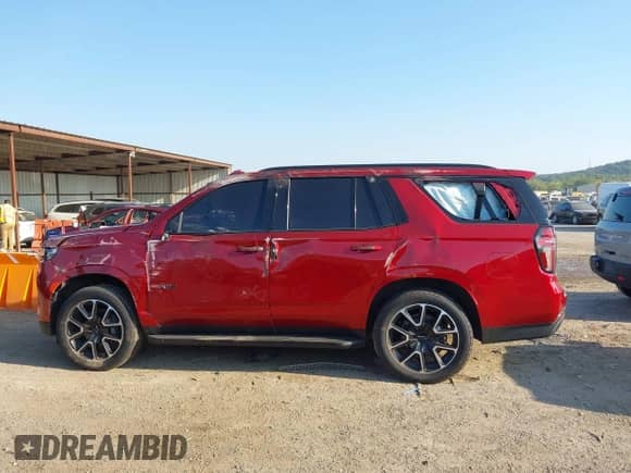 2021 Chevrolet Tahoe RST z VIN 1GNSKRKD0MR421104, wystawiony jako IAAI lot #43209576 z przebiegiem 93 123 mil mil oraz . Historia ofert i sprzedaży dostępna na DreamBid. Obrazek 15.