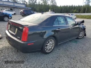 ✅ 2009 Cadillac STS RWD • VIN: 1G6DK67V990134795 • Лот: 69980414. Опубликован ранее на Copart с пробегом 108 739 миль. Бесплатный доступ к архиву аукционных продаж из США и подробный отчёт об истории автомобиля на DreamBid. Изображение 3.