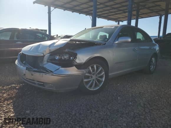 2007 Hyundai Azera SE z VIN KMHFC46F57A205043, wystawiony jako Copart lot #49531885 z przebiegiem 107 272 mil mil oraz Czysty tytuł • Clean title. Historia ofert i sprzedaży dostępna na DreamBid. Obrazek 1.