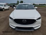 ✅ 2021 Mazda CX-5 Signature • VIN: JM3KFBEY2M0356013 • Lot: 66410025. Wystawiony na Copart z przebiegiem 47 279 mil. Bezpłatny archiwum sprzedaży aukcyjnych z USA i szczegółowy raport historii pojazdu na DreamBid. Zdjęcie 5.