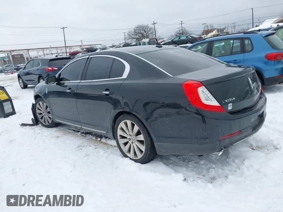 ✅ 2013 Lincoln MKS EcoBoost • VIN: 1LNHL9FT7DG604069 • Lot: 41362256. Listed on IAAI with 92,789 mi. Free auction sales archive from the USA and detailed vehicle history report at DreamBid. Image 3.