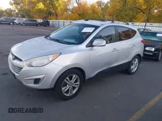 2012 Hyundai Tucson Limited with VIN KM8JUCAC2CU433184, listed as a IAAI auction lot 43557803 with 204,139 mi miles and . Bid and sale history available at DreamBid. Image 2.