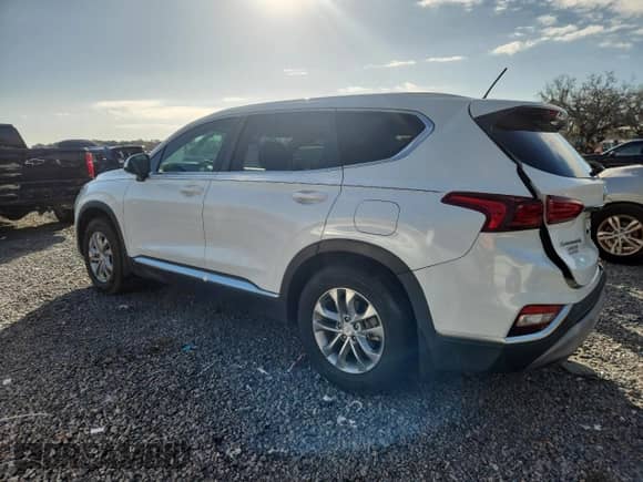 ✅ 2020 Hyundai Santa Fe SE • VIN: 5NMS23AD6LH251874 • Lot: 90309675. Listed on Copart with 27,438 mi. Free auction sales archive from the USA and detailed vehicle history report at DreamBid. Image 2.