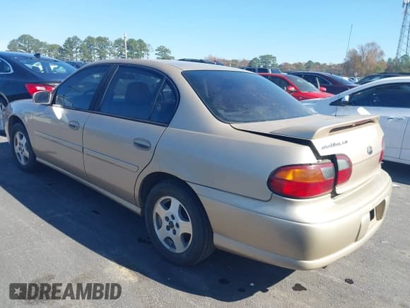 ✅ 2003 Chevrolet Malibu LS • VIN: 1G1NE52J33M615058 • Lot: 43684608. Listed on IAAI with 138,574 mi. Free auction sales archive from the USA and detailed vehicle history report at DreamBid. Image 3.