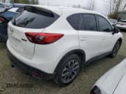 ✅ 2016 Mazda CX-5 Grand Touring • VIN: JM3KE4DY1G0803211 • Лот: 89537495. Опубликован ранее на Copart с пробегом 255 646 миль. Бесплатный доступ к архиву аукционных продаж из США и подробный отчёт об истории автомобиля на DreamBid. Изображение 3.