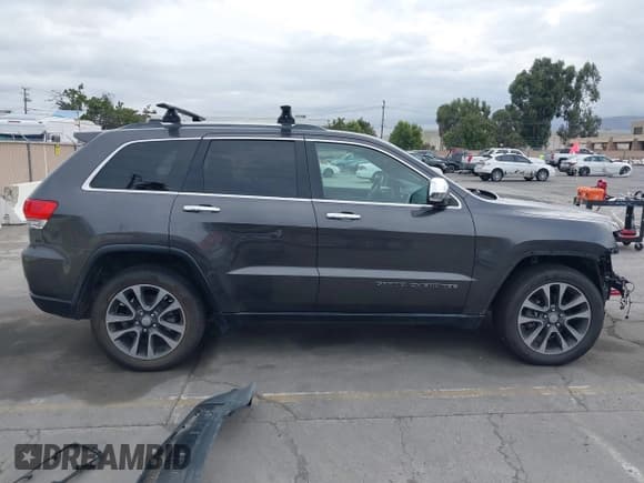 ✅ 2018 Jeep Grand Cherokee Limited • VIN: 1C4RJFBG5JC139977 • Lot: 43325810. Wystawiony na IAAI z przebiegiem 124 176 mil. Bezpłatny archiwum sprzedaży aukcyjnych z USA i szczegółowy raport historii pojazdu na DreamBid. Zdjęcie 14.