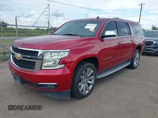 2015 Chevrolet Suburban LTZ z VIN 1GNSCKKC9FR243532, wystawiony jako IAAI lot #43300151 z przebiegiem 154 827 mil mil oraz . Historia ofert i sprzedaży dostępna na DreamBid. Obrazek 2.